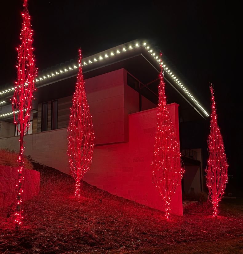 holiday garland and string lights on a front porch in Greenwood Village Colorado