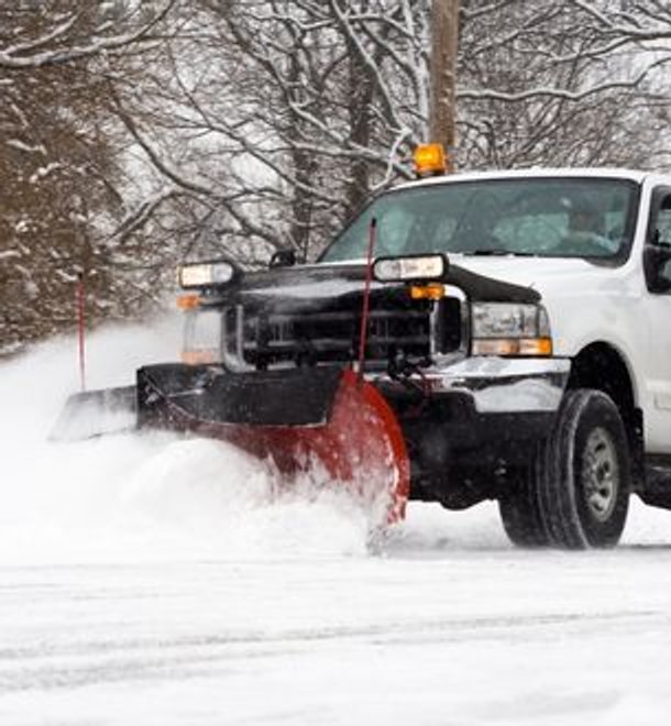 sunlight sprinkler work truck removing snow
